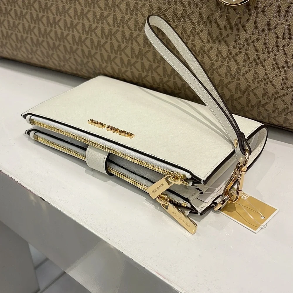 MICHAEL KORS LARGE DOUBLE ZIP WRISTLET WALLET PHONE CASE CLUTCH
Optic White - Picture 8 of 16